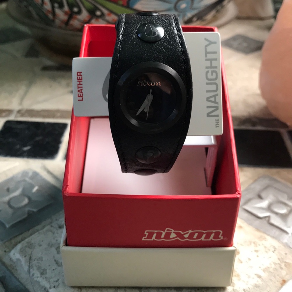 Nixon black leather wristwatch womens